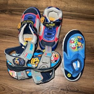 3 pairs in 1… paw patrol swim shoes & sandals plus Daniel the Tiger shoes.